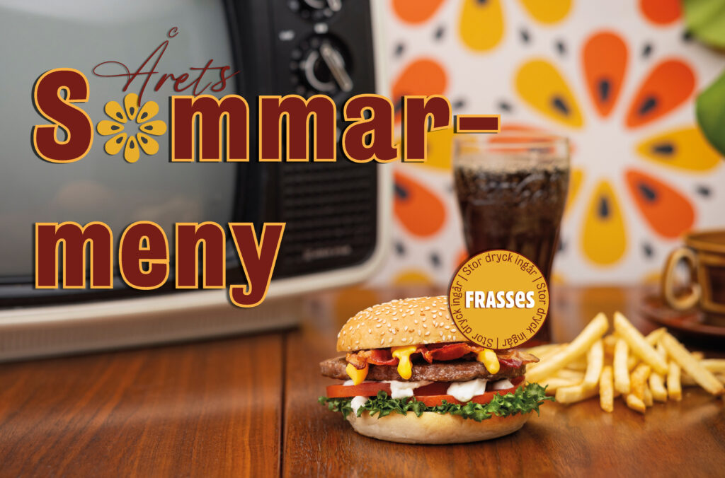 Sommarmenyn 2025, en fräsch sommarburgare med sallad, tomat, bacon och dressing tillsammans med varmost.
