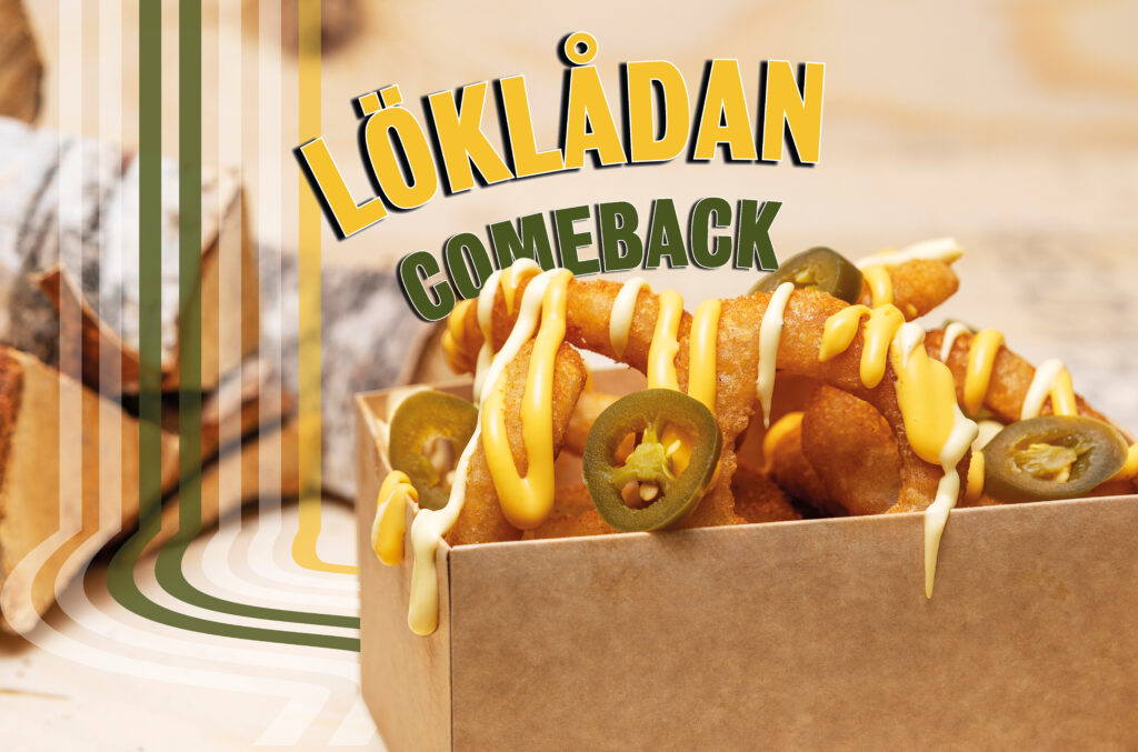 Lökringar toppade med varmost, bearnaise, jalapeños & baconkrydda.